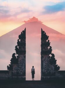 Photo of Person Standing on a Famous Temple