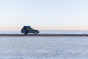 Black Suv on Gray Sand